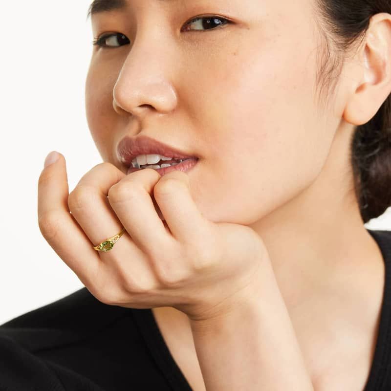 Oval Peridot And Diamond Accent Birthstone Ring In 14K Yellow Gold